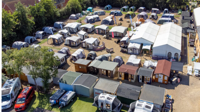 drone shot of tent field