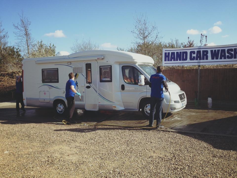 Motorhome being cleaned at the Vehicle Hand-Wash, The Leisure Village, Blofield.