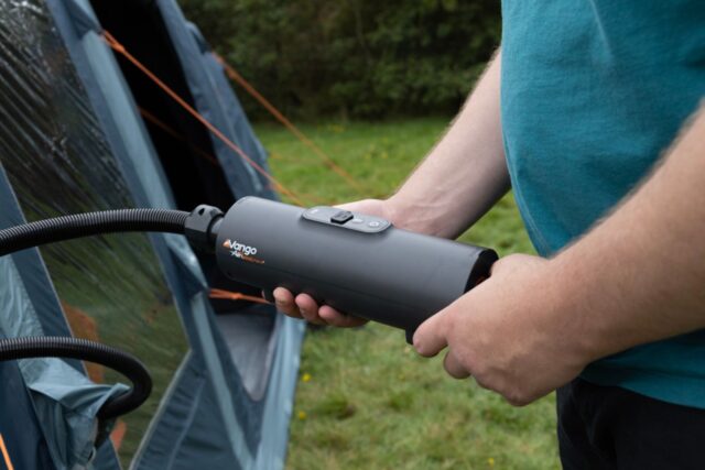 Person using the vango tempest airbeam rechargeable pump